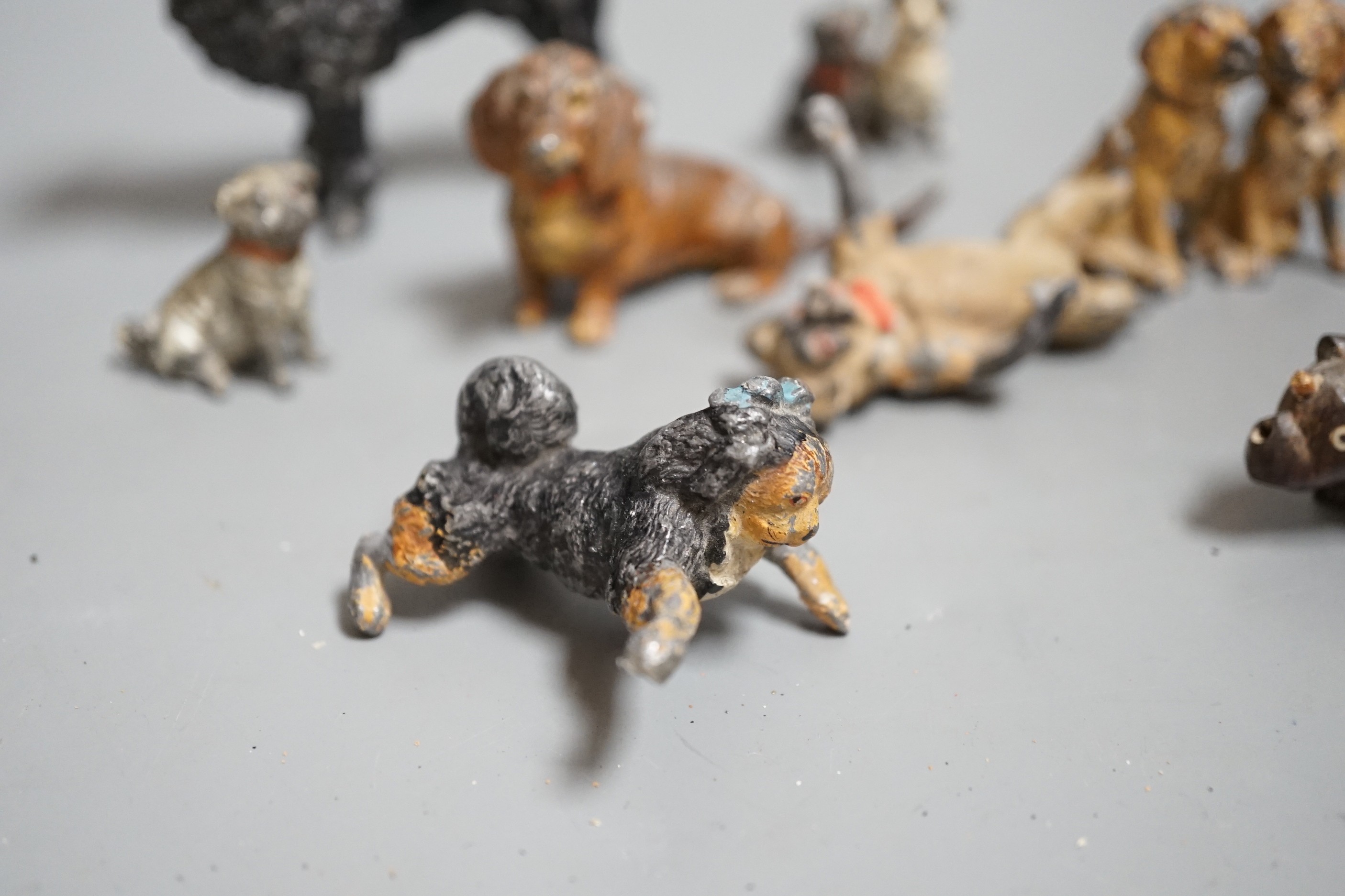 A small collection painted cast metal figures, dogs, to include ‘dancing dogs’, (group)